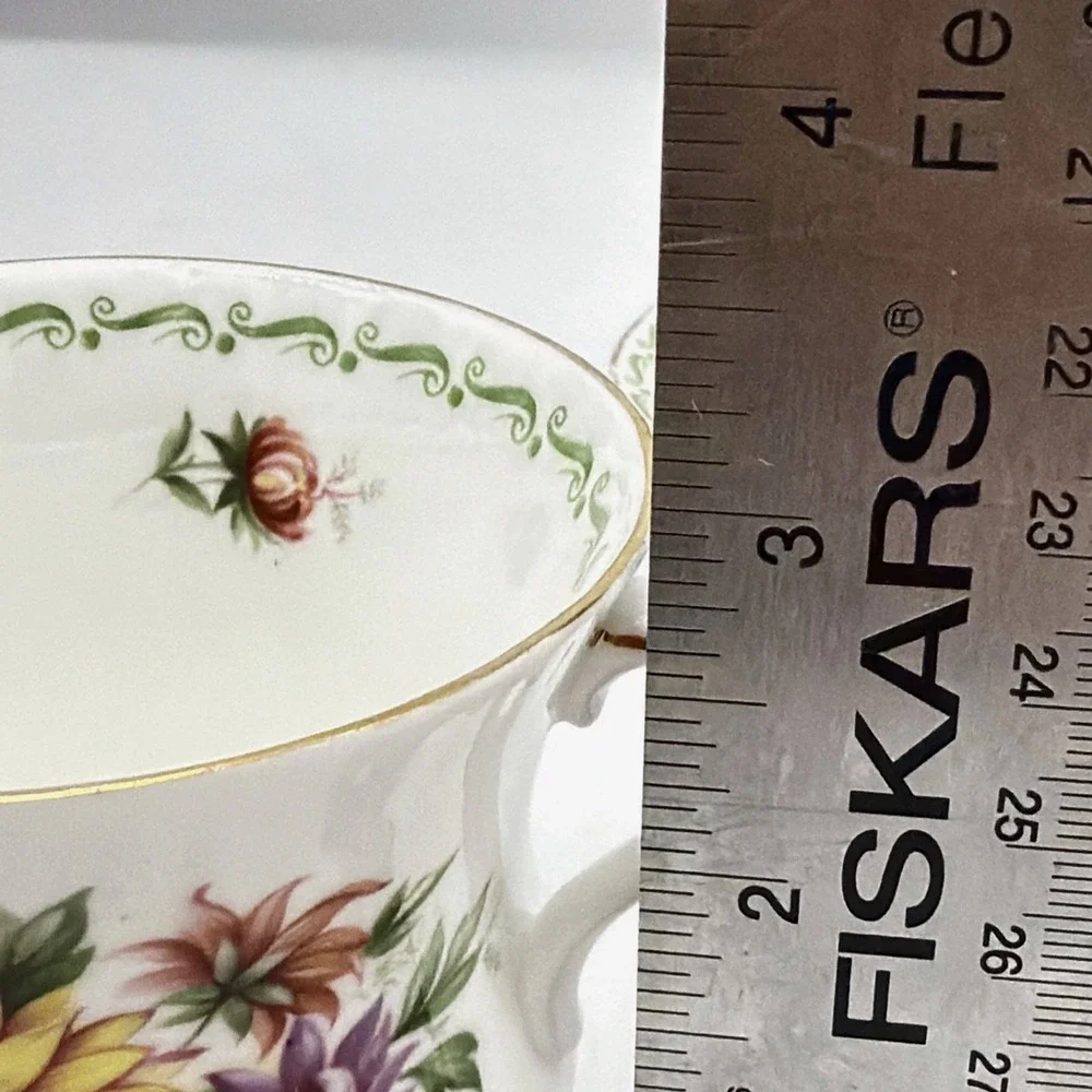 Vintage Queen's Rosina Wild Flowers fine bone china Tea cup with matching saucer